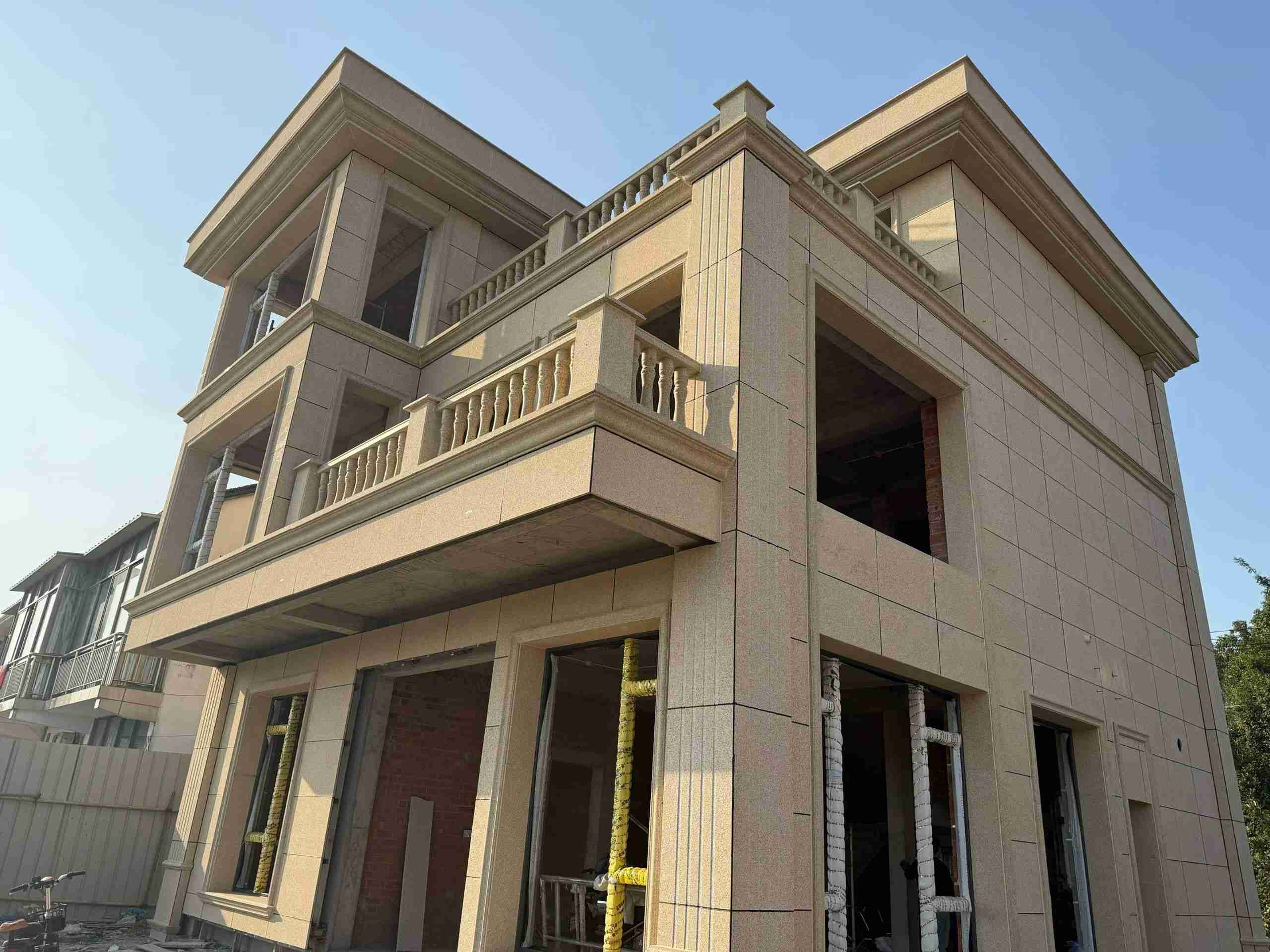 廊坊 黄金麻花岗岩石材荔枝面外墙干挂效果展示